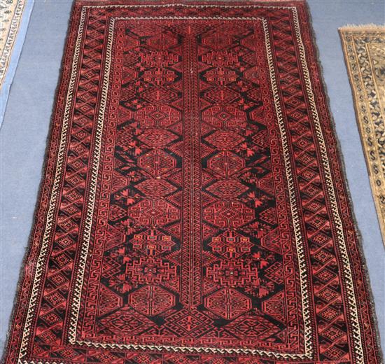 A red ground Persian rug 180 x 120cm